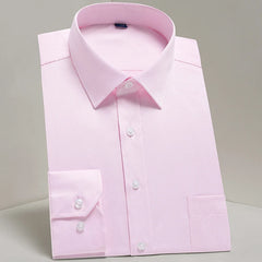 A light pink long-sleeve dress shirt with a button-up front and a chest pocket.
