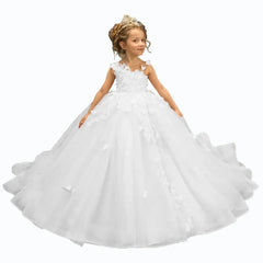 A young girl wears a sleeveless white floor-length ball gown with 3D floral appliques.