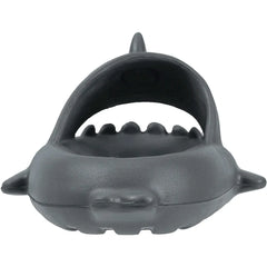 A front view of a dark grey shark-shaped slide sandal with a textured finish.
