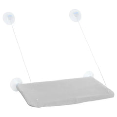 A grey fabric cat hammock designed to mount to a window with four suction cups and support wires.