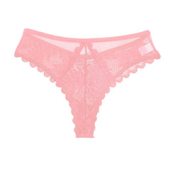 A pair of pink low-rise lace thong panties with a scalloped edge and a hollow-out design.