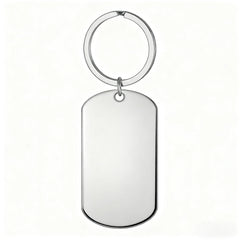 A blank, polished silver rectangular dog tag keychain with a circular split ring.