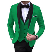 A man wears a bright green three-piece suit with a black shawl lapel, vest, and bow tie.