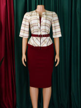 A slim-fit midi dress featuring a plaid V-neck top, half sleeves, and a solid maroon pencil skirt.