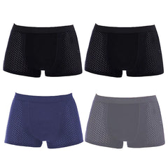 A set of four men's breathable mesh boxer briefs in black, navy, and grey.
