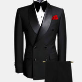 A black double-breasted tuxedo suit with a shawl lapel, white shirt, bow tie, and red pocket square.