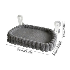 A grey plush cat window perch with suction cups, measuring 55cm by 33cm by 20cm.