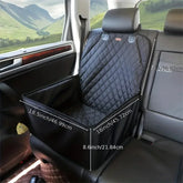 A black quilted dog car seat cover installed on a vehicle seat with dimensions labeled.