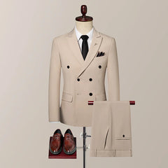A beige double-breasted suit set with a white shirt, black tie, and brown leather dress shoes.