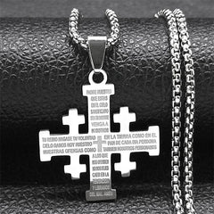 A silver-toned Jerusalem cross pendant necklace engraved with the Lord's Prayer in Spanish.