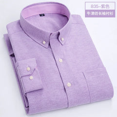 A long-sleeved purple Oxford button-down shirt with a chest pocket and a striped inner collar.