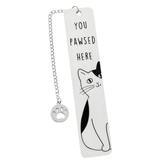A silver stainless steel bookmark featuring a cat illustration and the text You Pawsed Here.