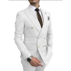 A man wearing a white double-breasted blazer and matching pants with a dark tie.