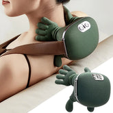 A green bionic neck and shoulder massager with hand-shaped nodes and a brown strap.