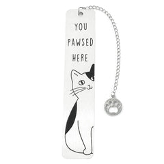 A silver stainless steel bookmark featuring a cat illustration and the text You Pawsed Here.