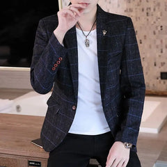 A slim fit men's blazer in a dark blue plaid pattern with a single button closure.