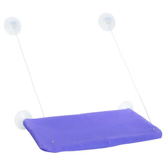 A purple cat hammock with four suction cups for mounting on a window.