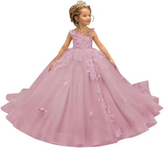 A girl wears a floor-length, dusty pink tulle ball gown with 3D butterfly and floral appliques.