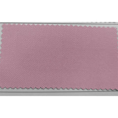 A rectangular fabric swatch in a dusty pink shade with a visible diagonal twill weave.