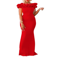 A woman wears a floor-length red off-shoulder evening dress with ruffled detailing.