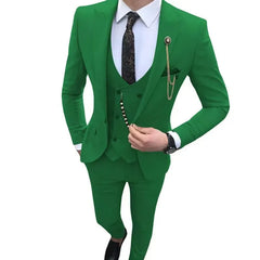 A man wears a slim-fit, bright green three-piece suit with a white shirt and patterned tie.