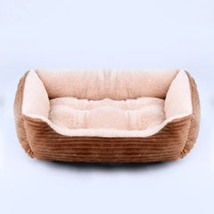 A rectangular pet bed with brown corduroy sides and a soft, cream-colored plush interior.