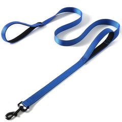 A blue nylon dog leash with two padded handles and a black metal clip.