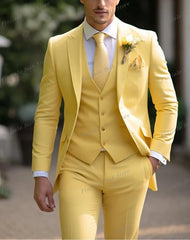 A man wears a bright yellow three-piece suit consisting of a jacket, vest, and trousers.