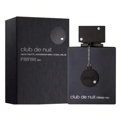 A black bottle and matching box of Club de Nuit Intense Man perfume with a decorative chain tag.