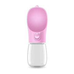 A portable pink pet water bottle with a clear plastic reservoir and a paw-print button.