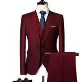 A three-piece burgundy suit set for men featuring a slim-fit jacket, vest, and matching trousers.