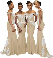 Four women wear matching beige off-the-shoulder mermaid dresses with white floral lace appliques.
