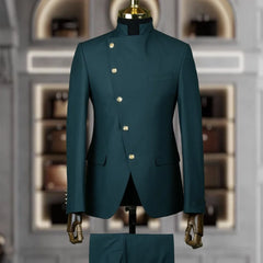 A dark teal two-piece men's suit featuring a stand collar and an asymmetrical button closure.