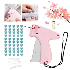 A pink handheld clothing fixer tool with a needle, bear-shaped fasteners, and plastic tags.