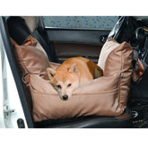 A tan waterproof pet car seat bed with a Shiba Inu resting inside on a vehicle seat.