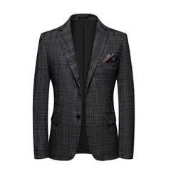 A dark grey slim-fit men's blazer with a subtle plaid pattern and two-button closure.