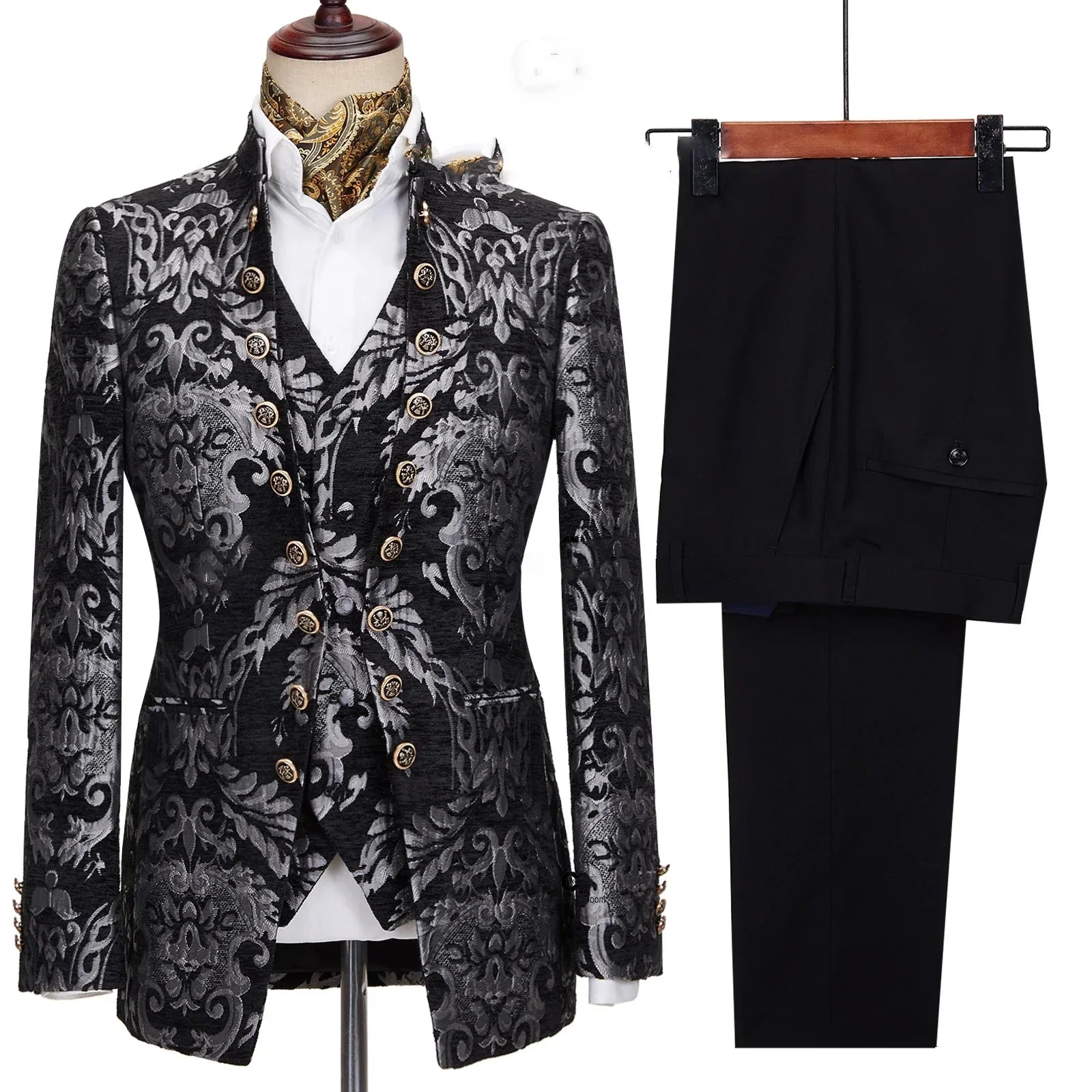 A three-piece men's suit featuring a black and silver floral jacquard blazer, vest, and trousers.