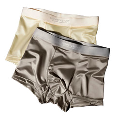 Two pairs of men's ice silk boxer shorts in beige and grey with branded elastic waistbands.