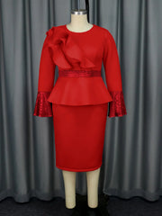 A red knee-length sheath dress with long sleeves, a ruffled bodice, and sequined accents.