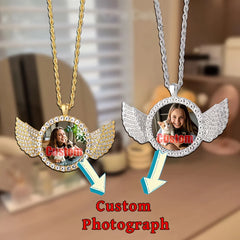 Two custom angel wing round photo necklaces in gold and silver tones with tennis chains.