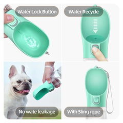 A portable mint green pet water bottle with a leak-proof design and a carrying strap.