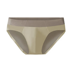 A pair of beige, low-waisted men's seamless briefs made from smooth, thin ice silk fabric.