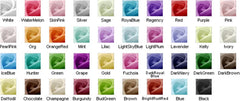 A color chart displaying various fabric swatches for custom dress orders.