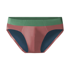 Men's low-waist seamless briefs in a solid color block design with a green waistband.
