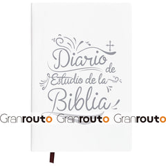 A white Bible study journal with grey decorative text and a small ribbon bookmark.
