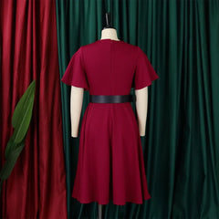 A burgundy mid-calf dress with butterfly sleeves and a black waist belt on a mannequin.