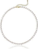 A dainty choker necklace featuring a strand of small, oval white freshwater pearls.