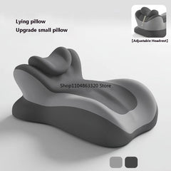A grey ergonomic memory foam wedge pillow with an adjustable headrest for neck and leg support.