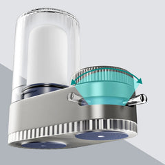 A faucet-mounted water purifier with a clear filter cartridge and a rotating selector switch.