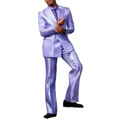 A man wears a purple satin two-piece suit with a peak lapel jacket and matching trousers.